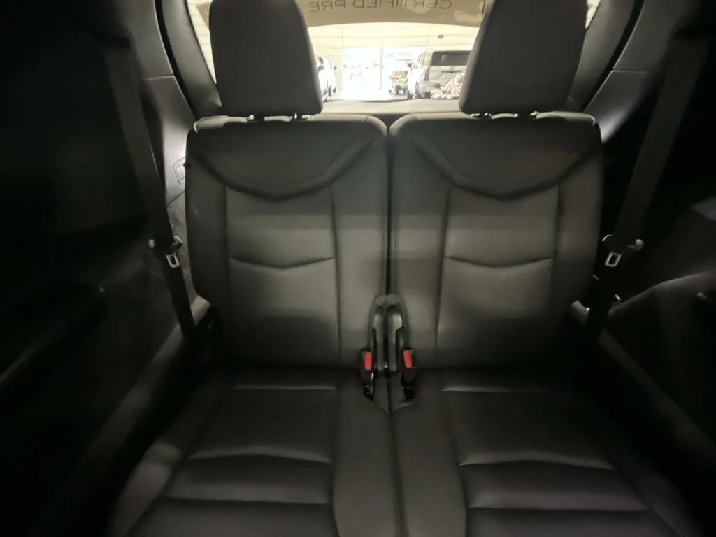 Used 2023 Stellar Black Metallic Cadillac Sport image 14