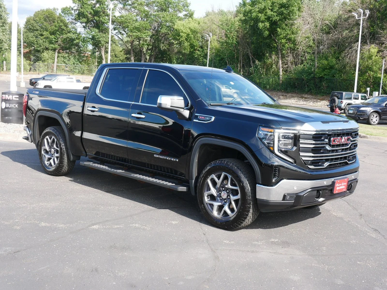 Certified 2023 GMC Sierra 1500 SLT with VIN 1GTUUDEL6PZ307999 for sale in White Bear Lake, Minnesota