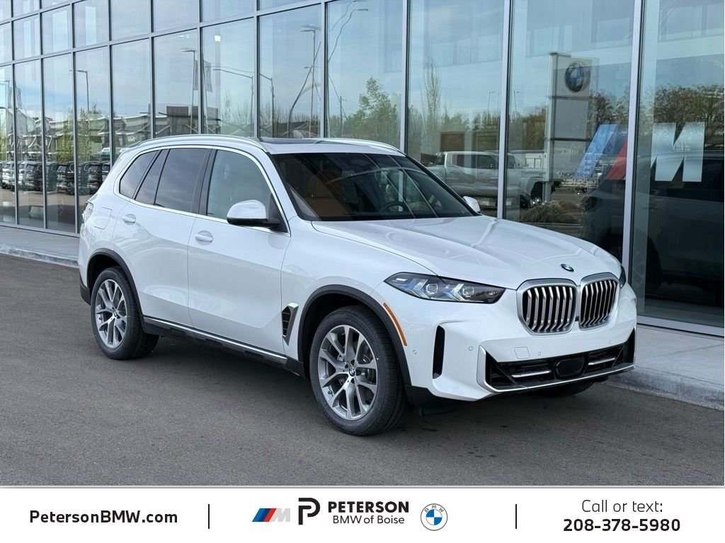New 2026 Mineral White Metallic BMW xDrive50e image 7
