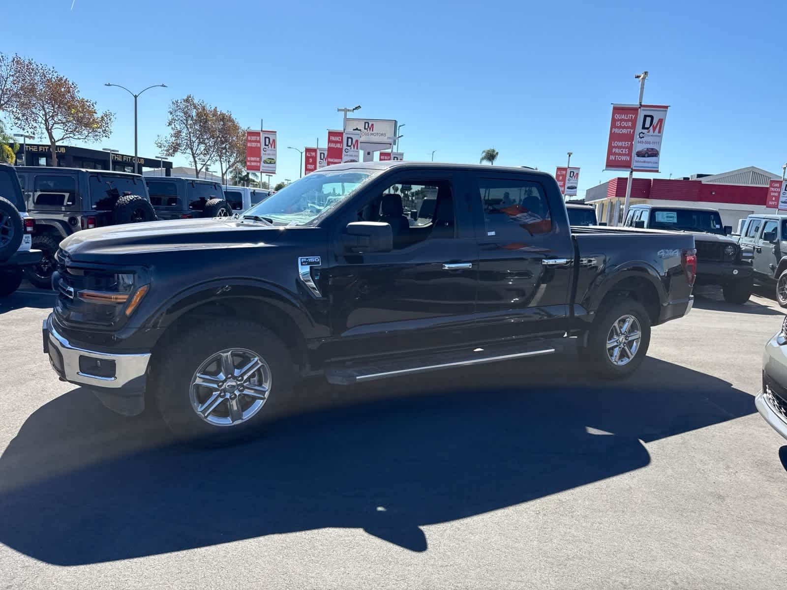 Used 2025 Agate Black Metallic Ford XLT image 16