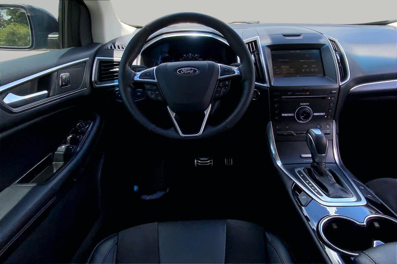 Used 2015 Tuxedo Black Ford Sport image 6