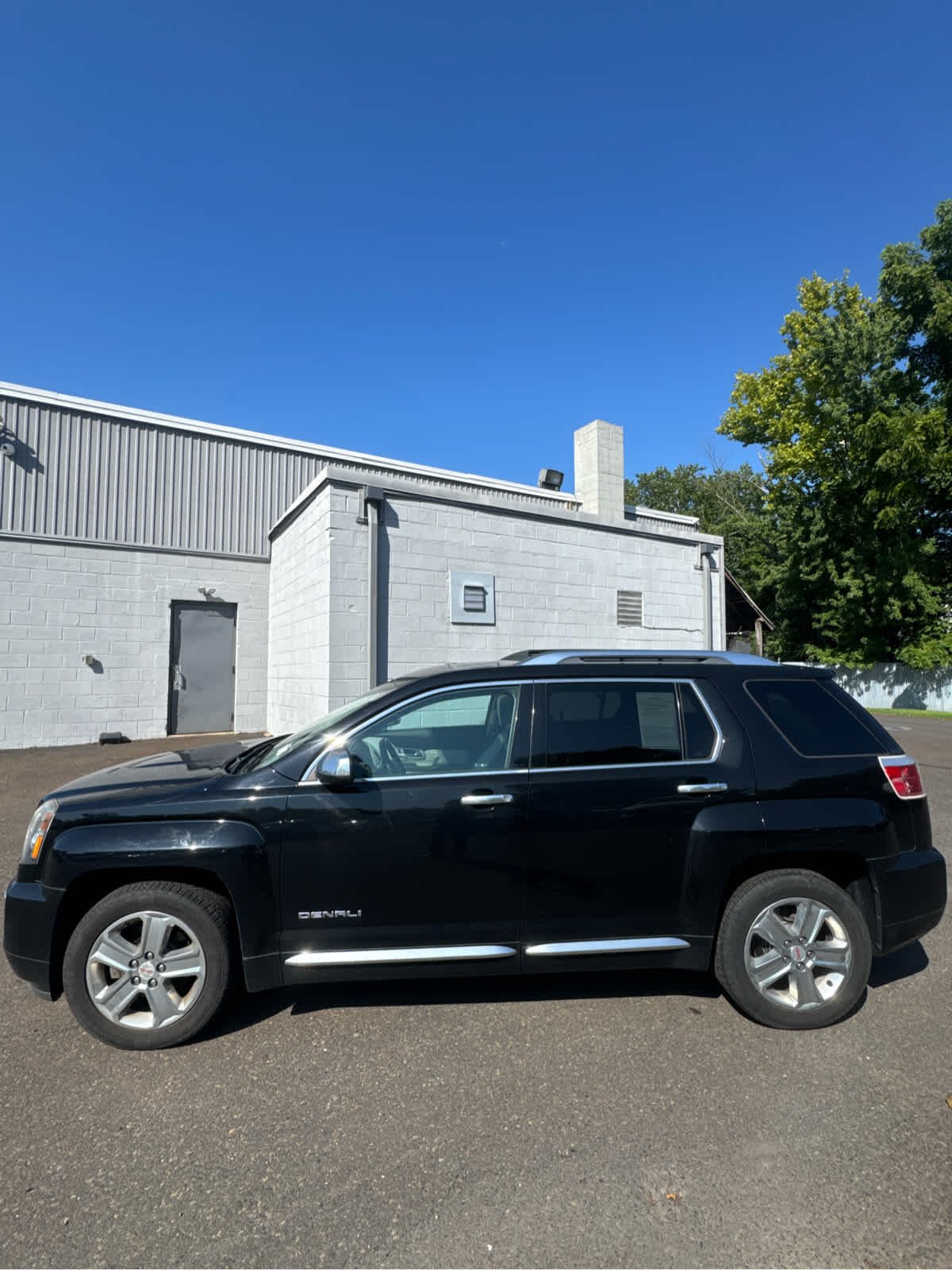 Used 2017 Ebony Twilight Metallic GMC Denali image 2