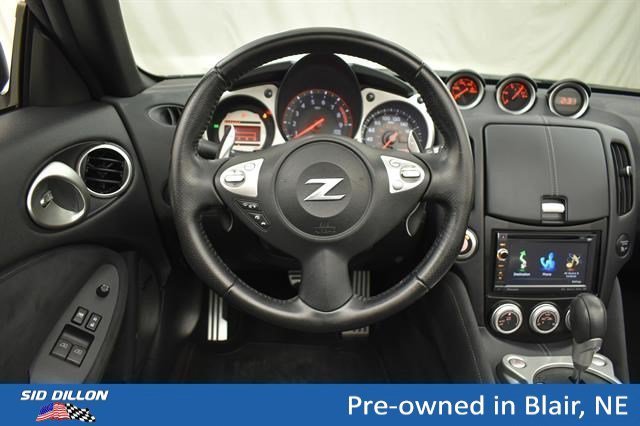 Used 2011 Magnetic Black Metallic Nissan Touring image 4