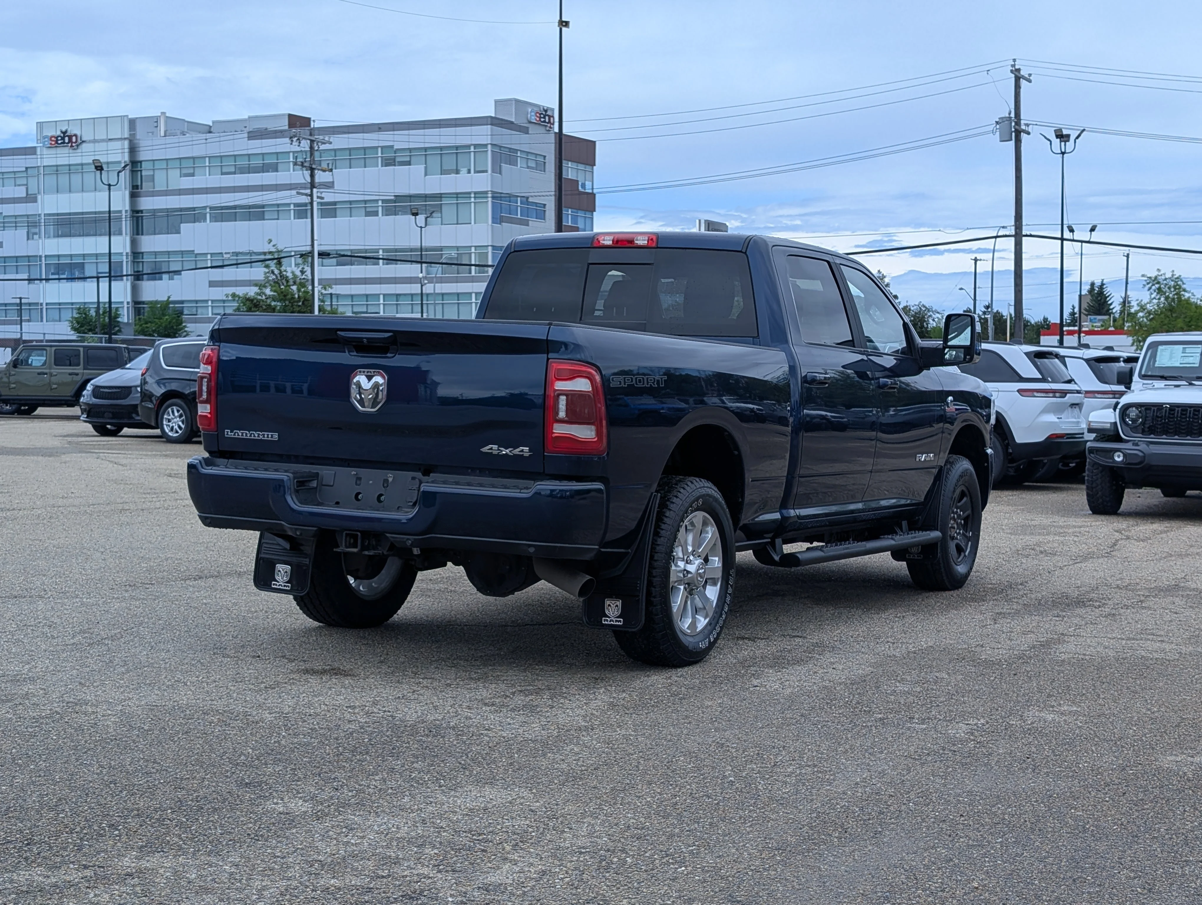 Used 2023 Patriot Blue Pearl Ram Laramie image 7