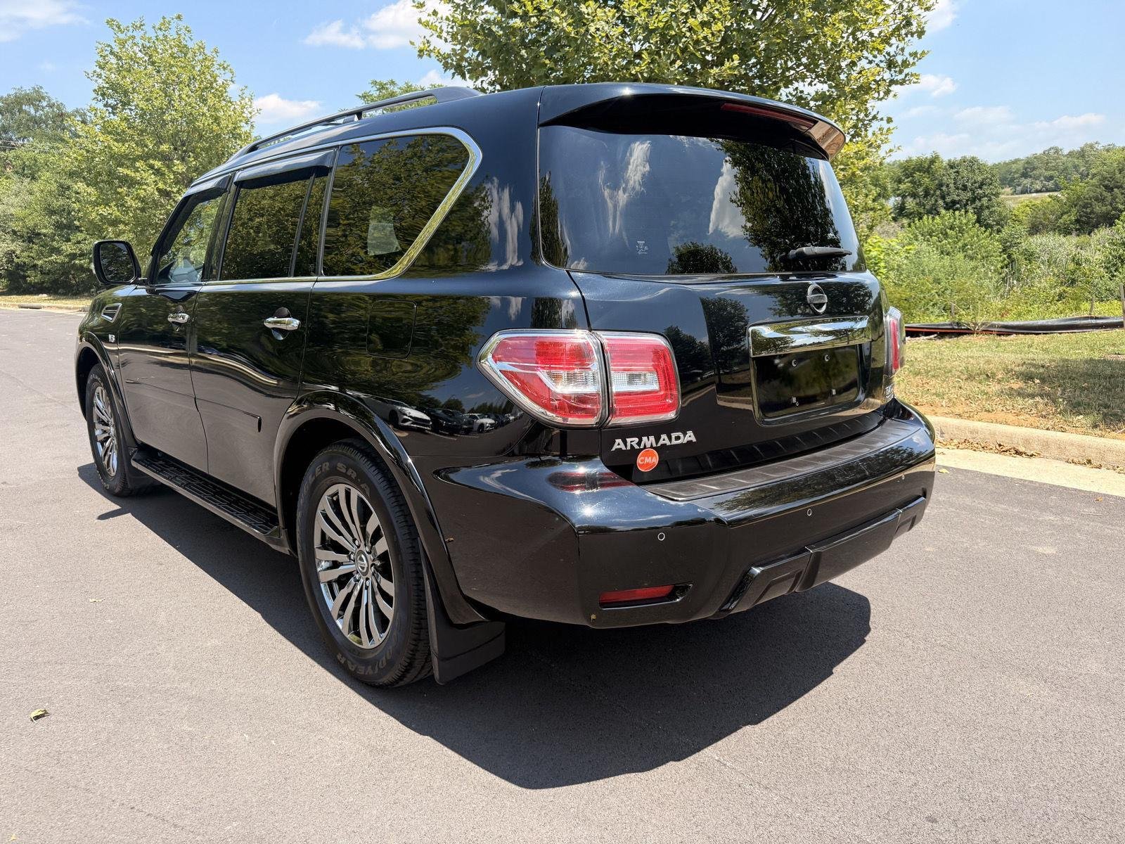 Used 2018 Super Black Nissan Platinum image 7