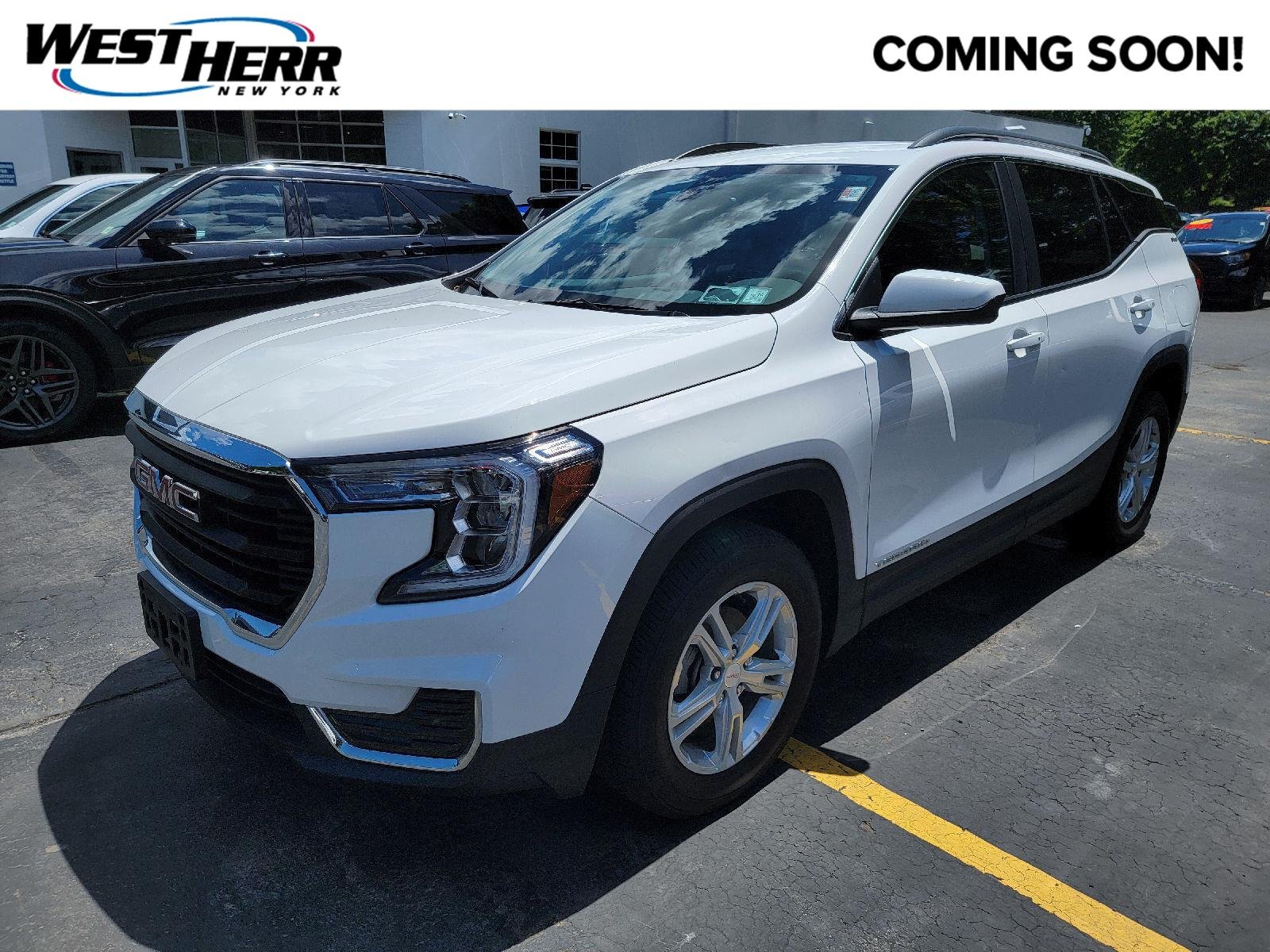 Used 2024 Summit White GMC SLE image 1