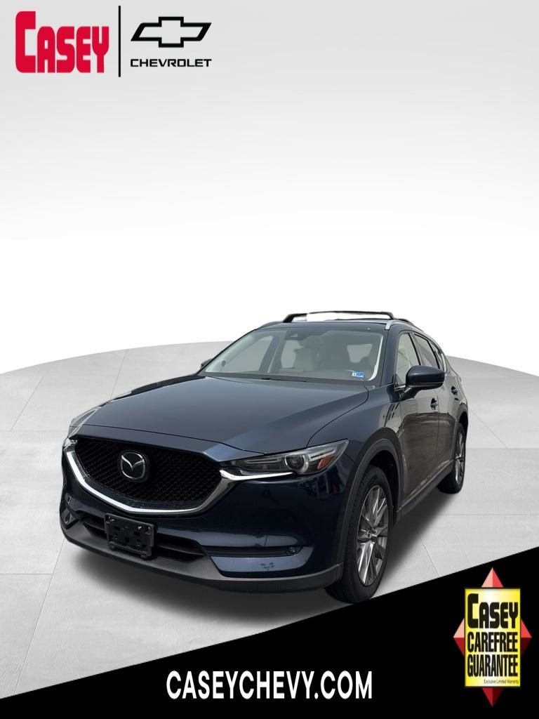 Used 2019 Blue Mazda Grand Touring image 1