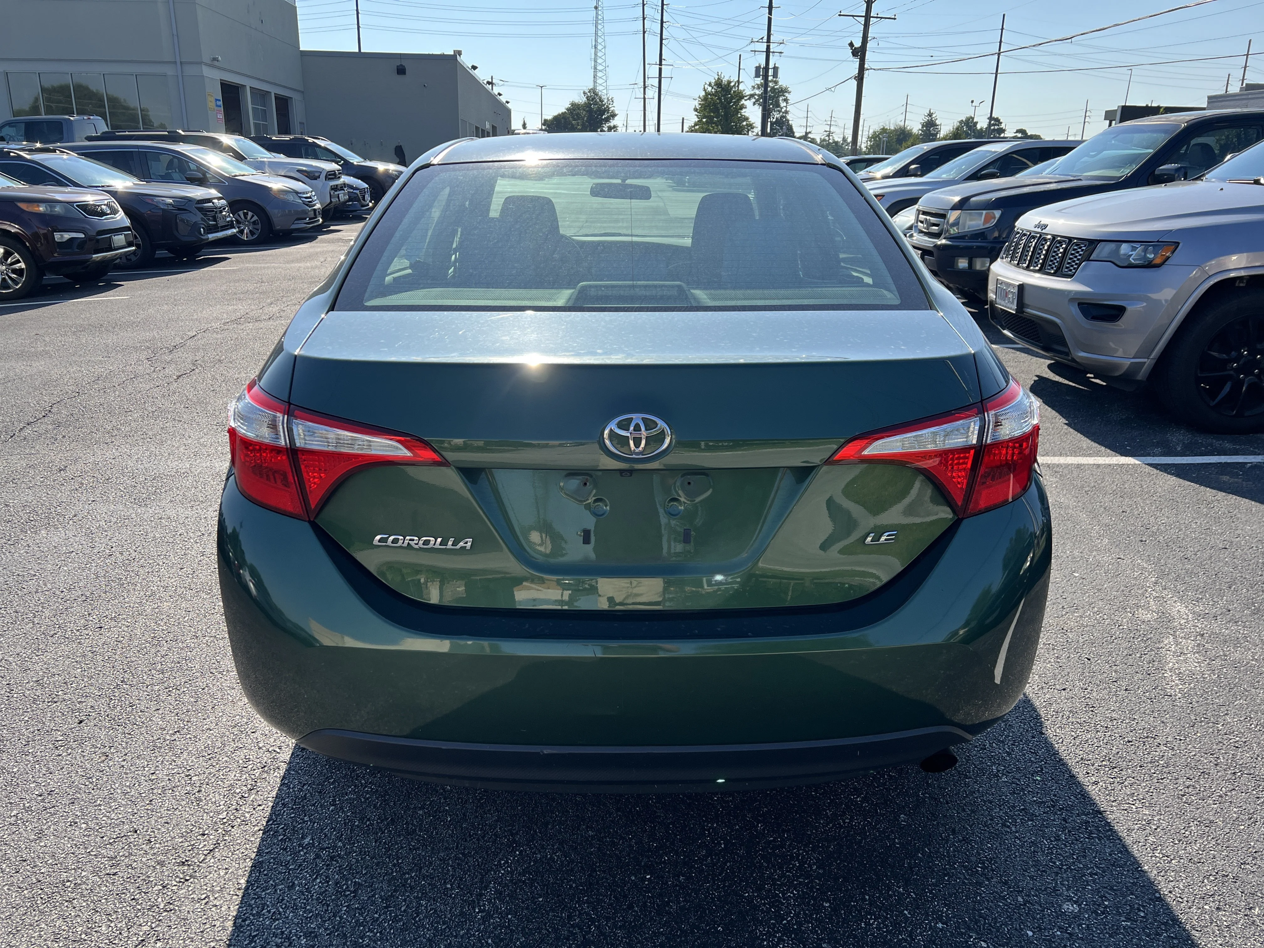 Used 2016 4evergreen Metallic Toyota LE Plus image 6