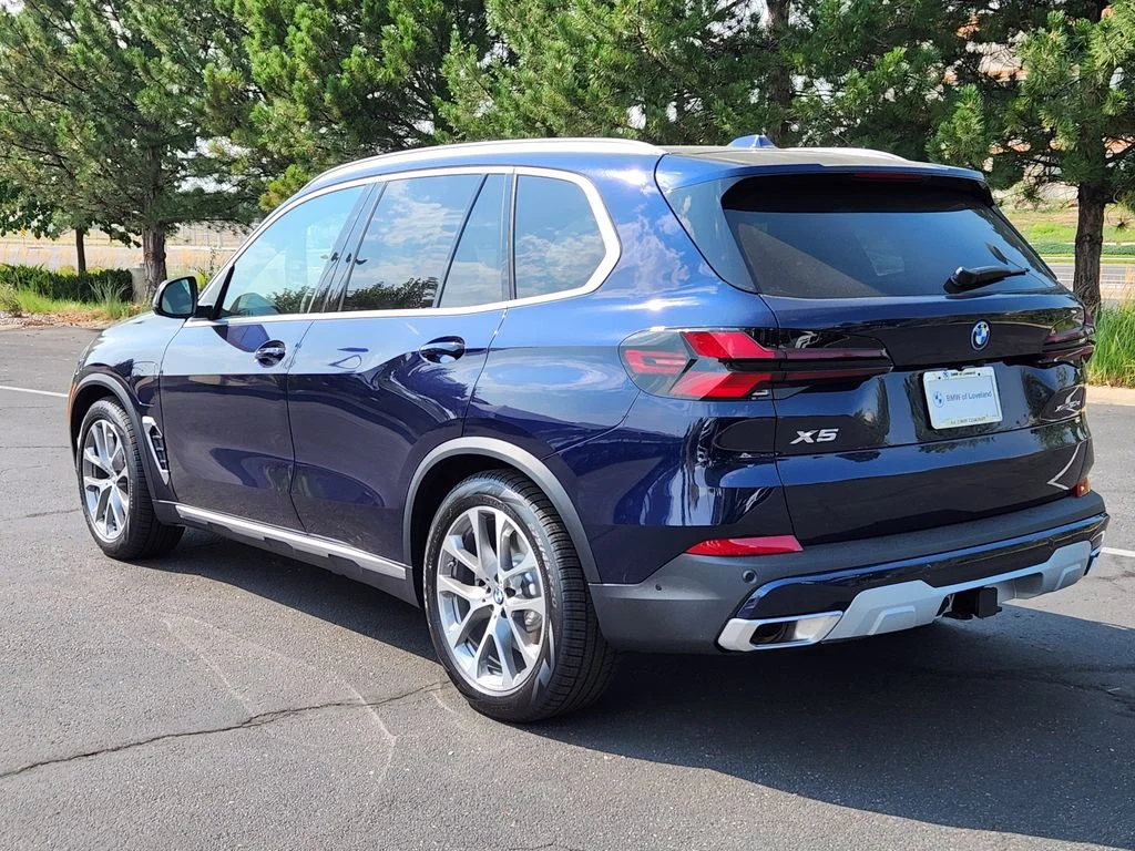 New 2026 Tanzanite Blue II Metallic BMW xDrive50e image 3