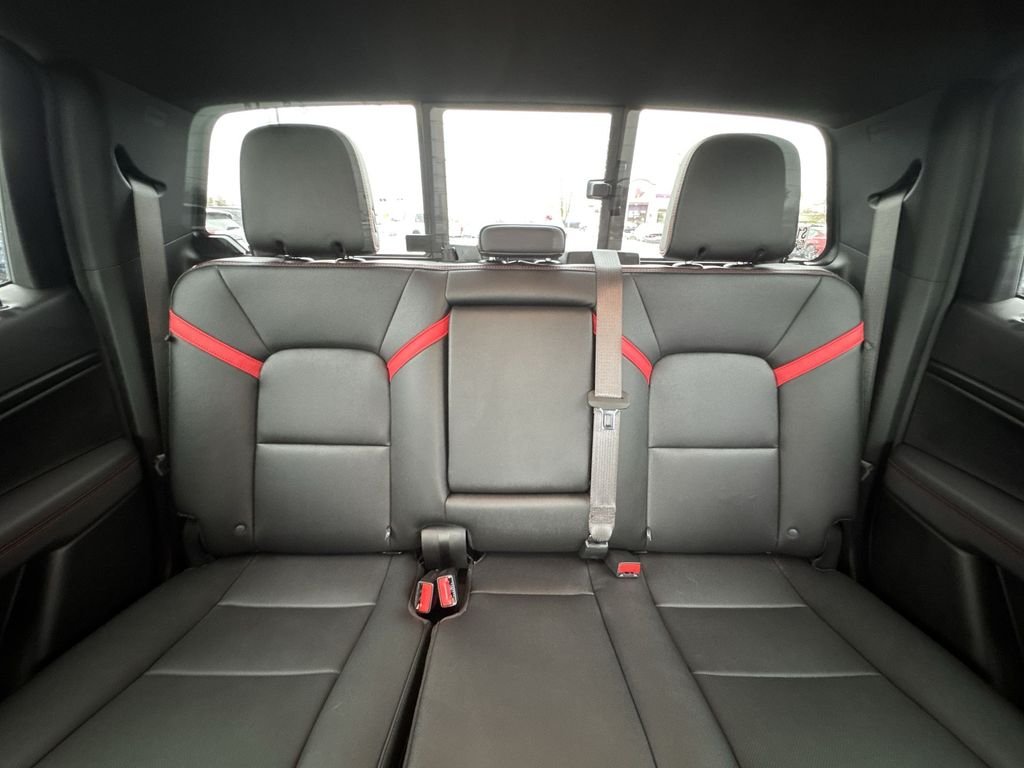 Used 2025 Orange Chevrolet Z71 image 24