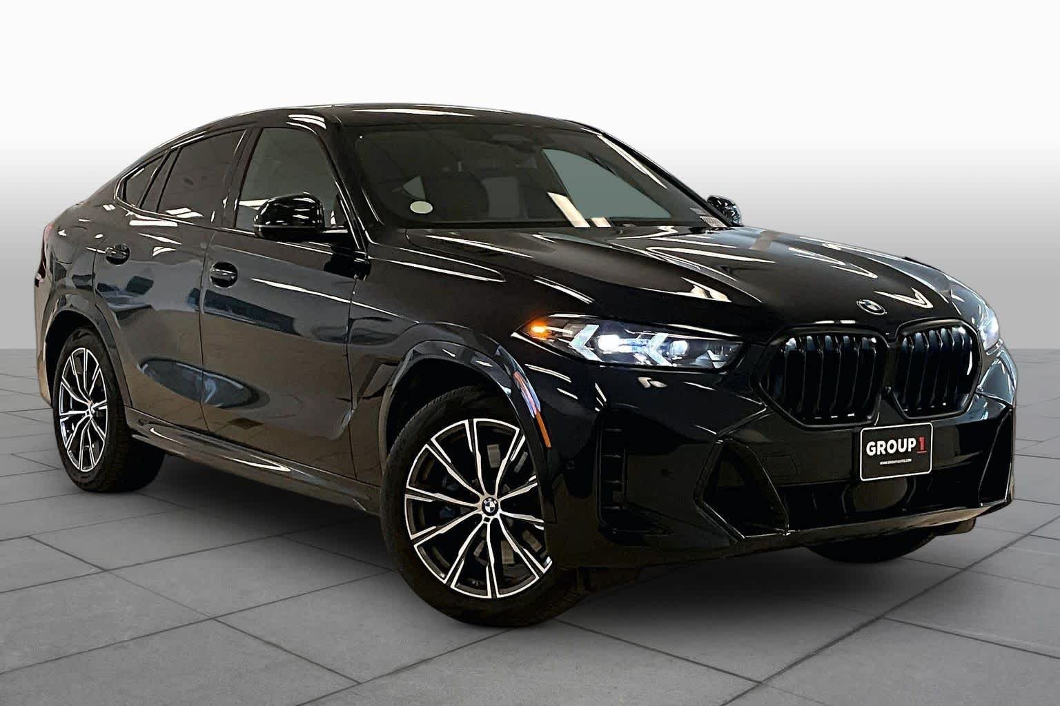 Used 2026 Carbon Black Metallic BMW xDrive40i image 2