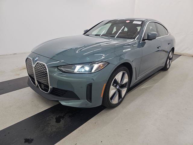 Certified Used 2025 Cape York Green Metallic BMW eDrive40 image 1