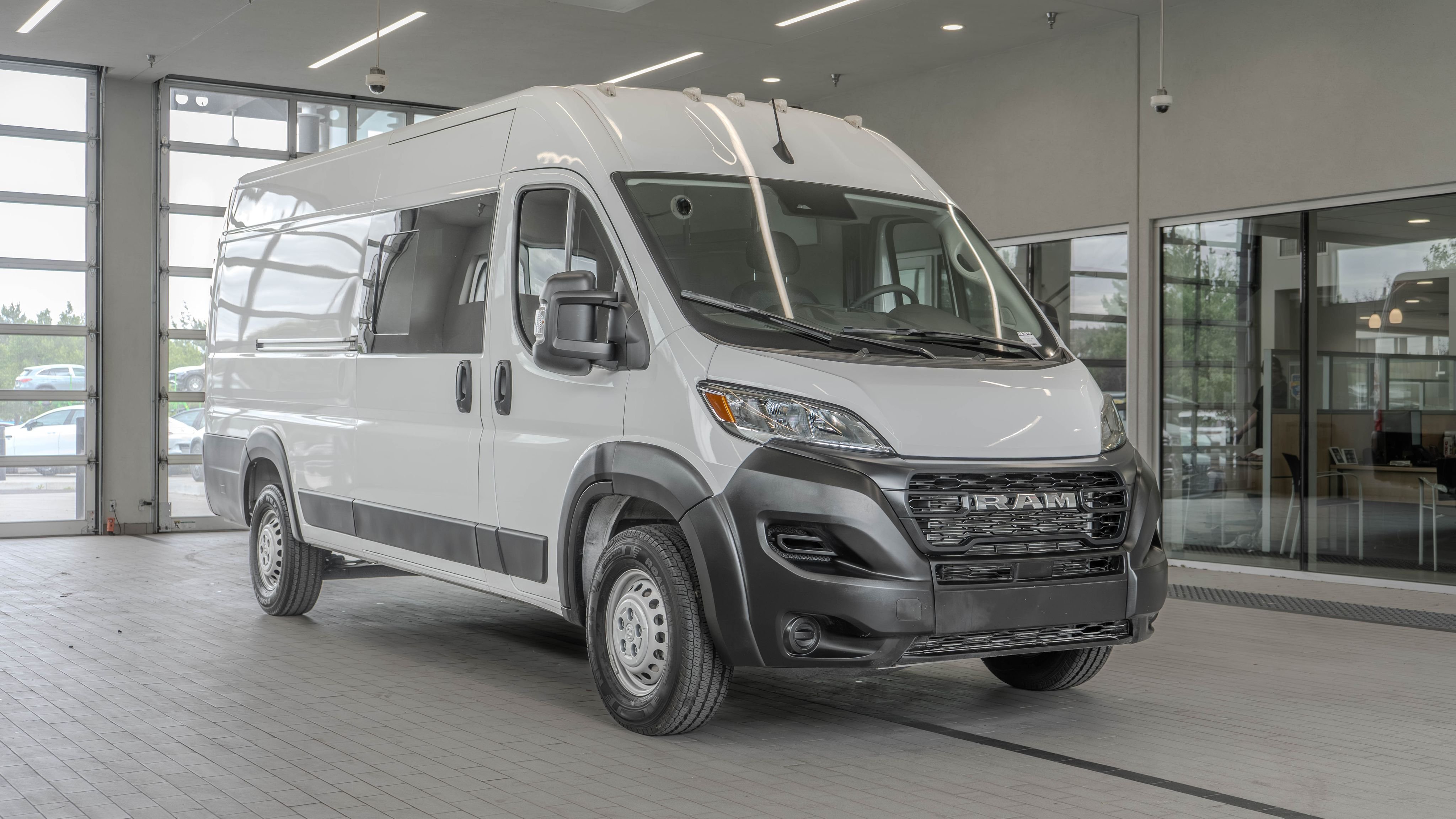 Used 2024 Bright White Clearcoat Ram High Roof image 21