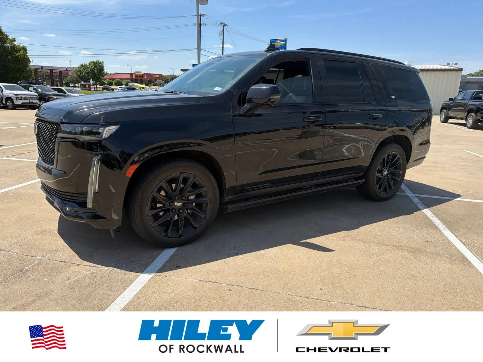 Used 2023 BLACK RAVEN Cadillac 4WD Sport Platinum image 1