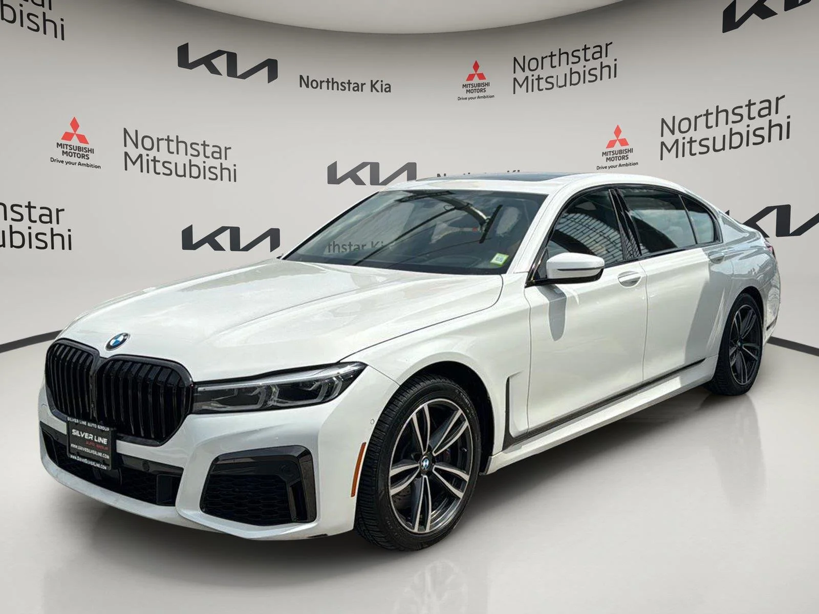 Used 2021 Mineral White Metallic BMW 750i xDrive image 1