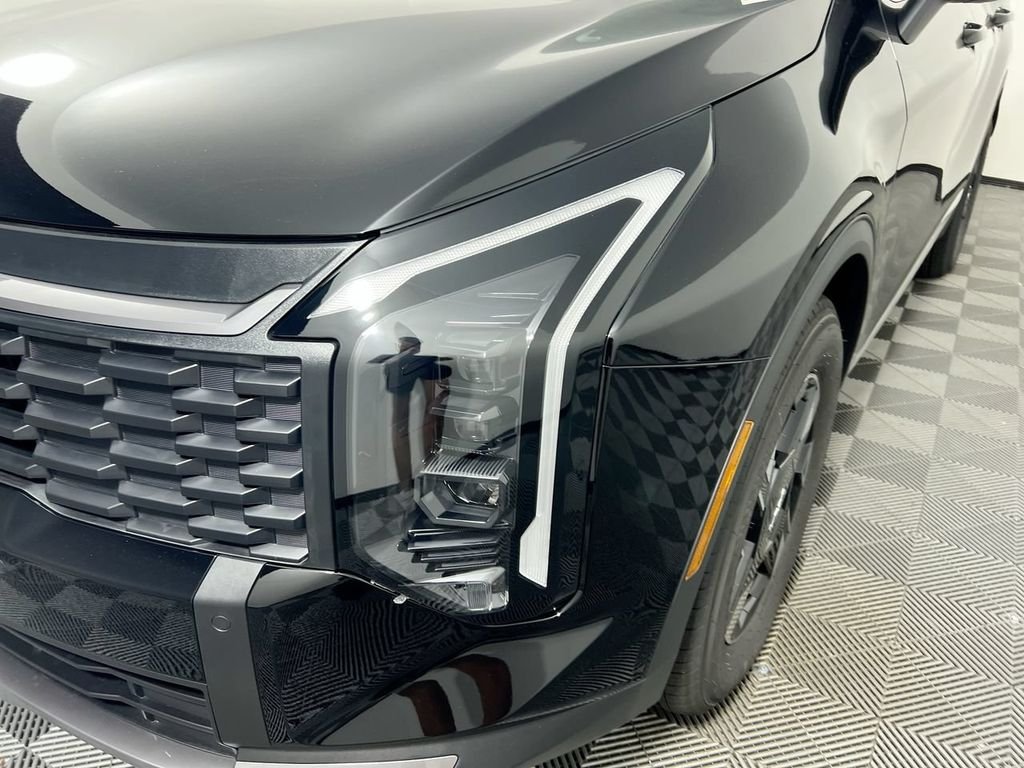 New 2026 Ebony Black Kia LX image 11