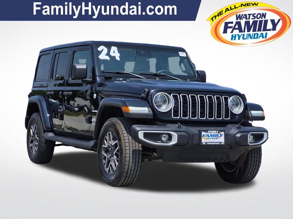 Used 2024 Black Jeep Sahara image 1