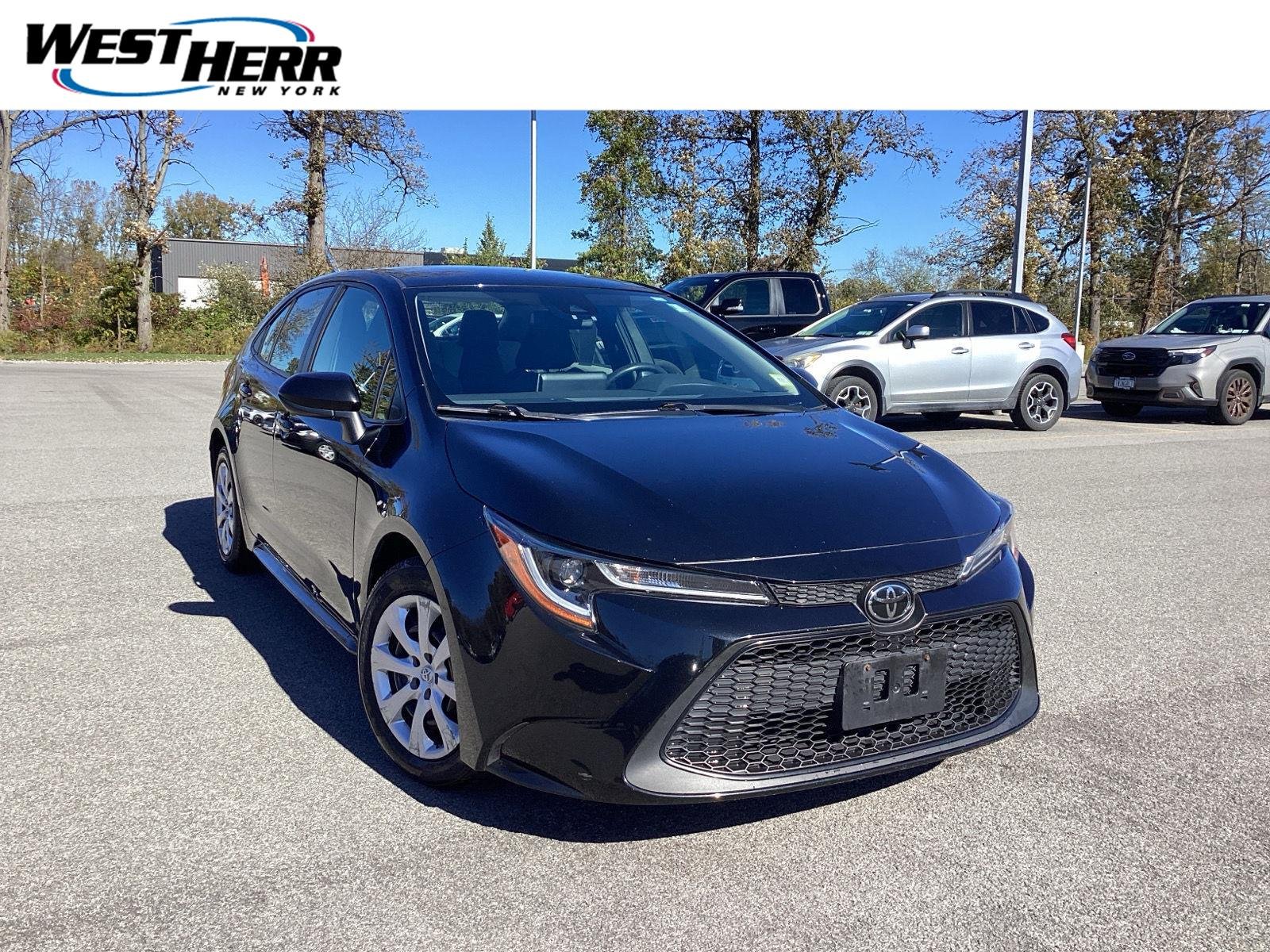 Used 2020 Black Sand Pearl Toyota LE image 1
