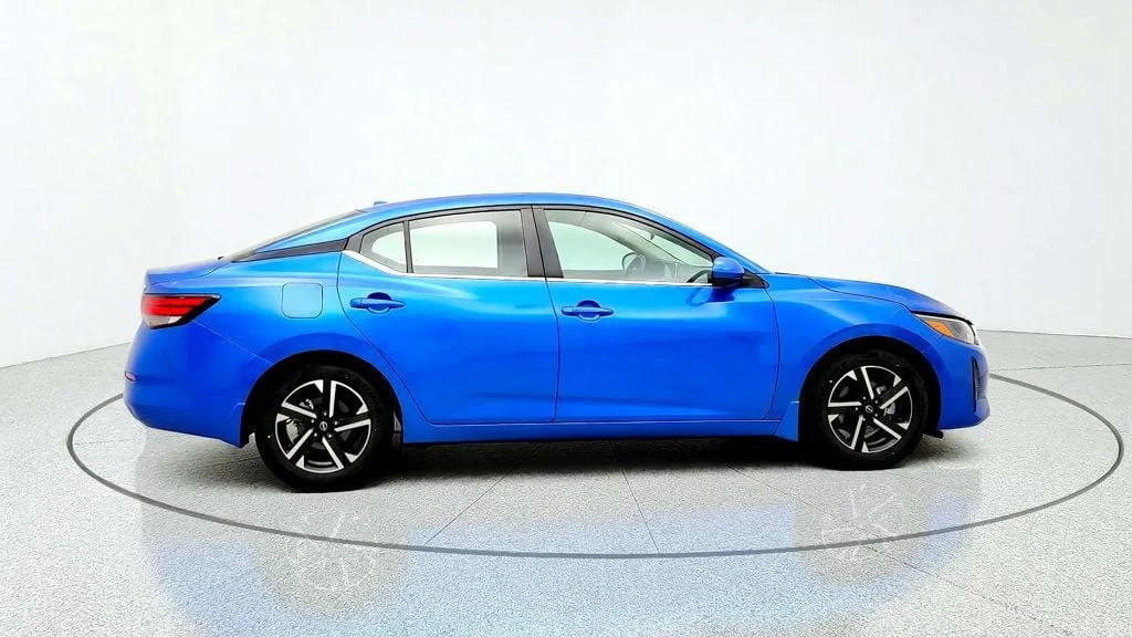 Used 2024 Electric Blue Metallic Nissan SV CVT image 4