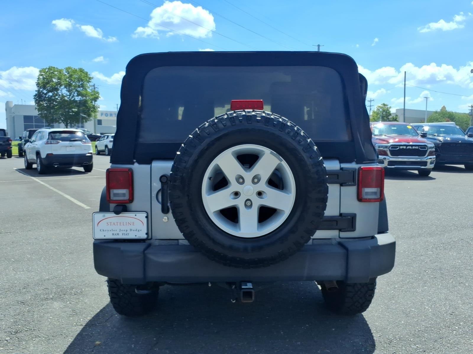 Used 2015 Billet Silver Metallic Clearcoat Jeep Sport image 15
