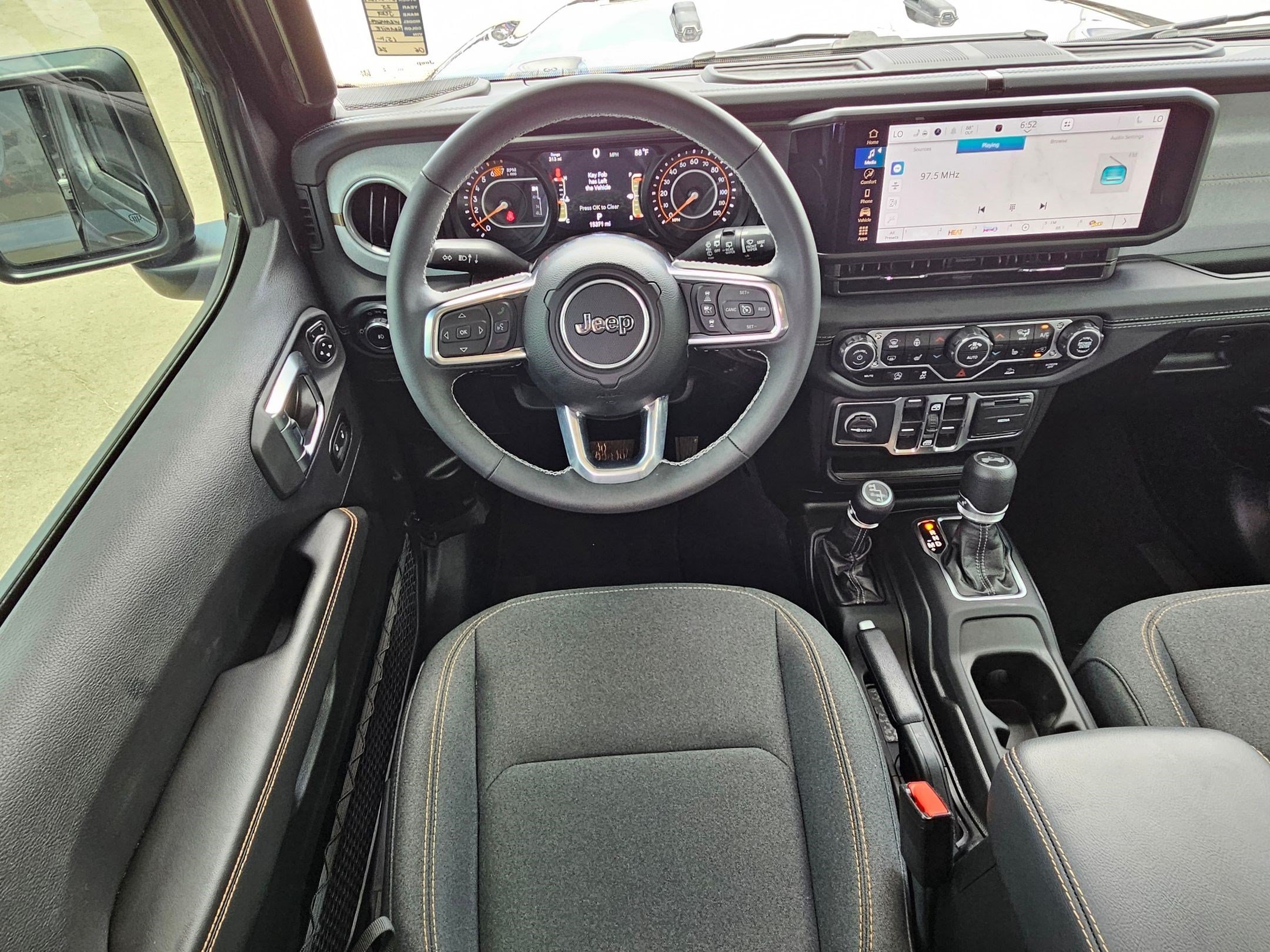 Used 2025 Granite Crystal Clearcoat Metallic Jeep Sahara image 25