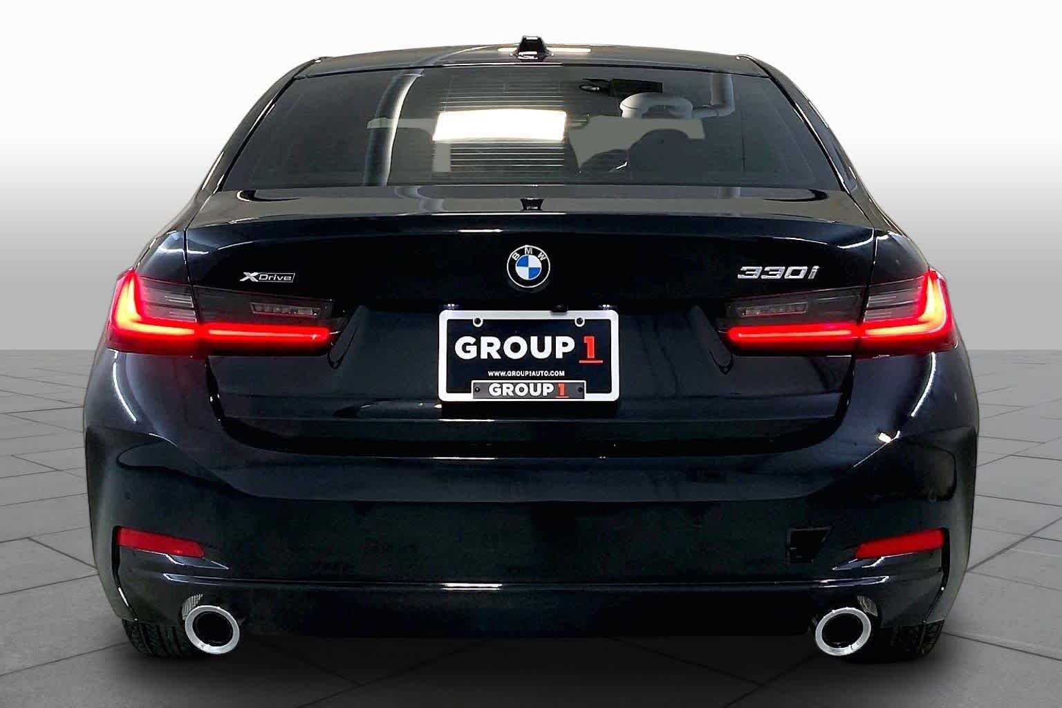 Used 2024 Black Sapphire Metallic BMW 330i xDrive image 4