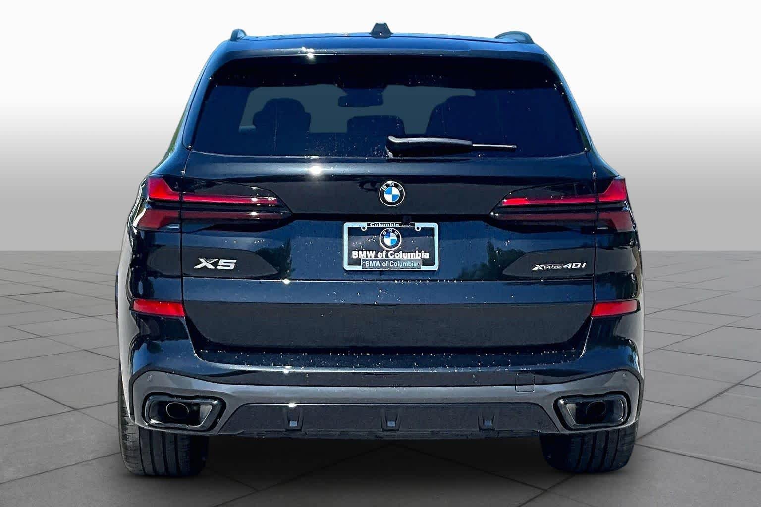 New 2026 Black Sapphire Metallic BMW xDrive40i image 4