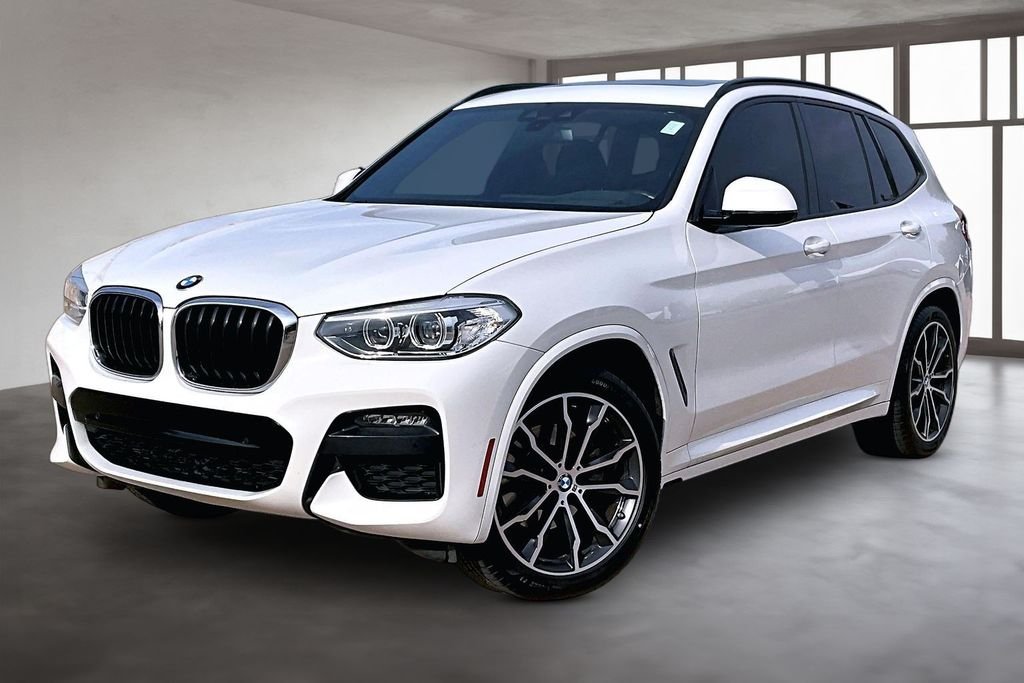Used 2021 White BMW xDrive30i image 1
