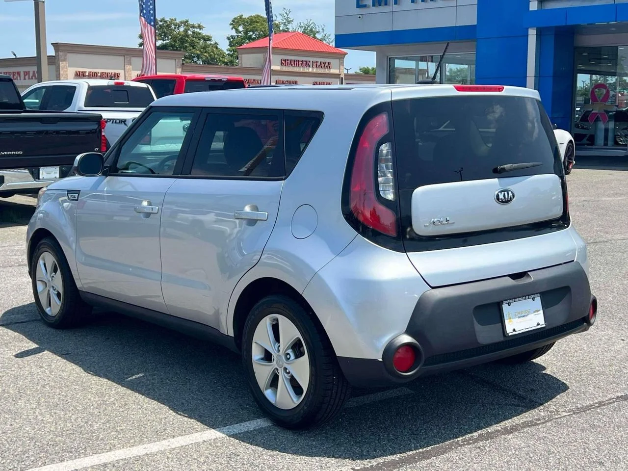 Used 2016 Bright Silver Kia Base image 7