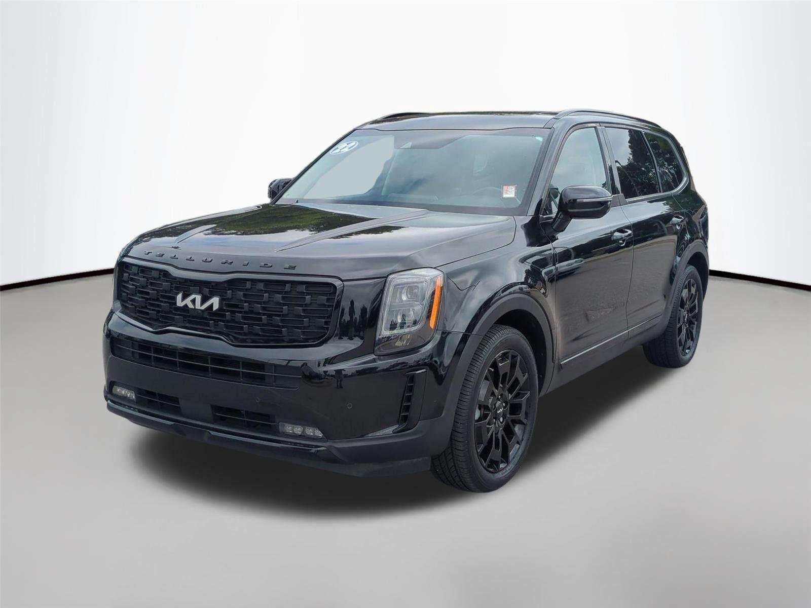 Used 2022 Ebony Black Kia SX image 1