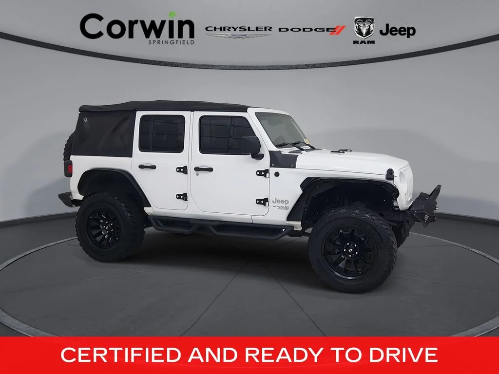 Used 2018 White Jeep Unlimited Sport image 1
