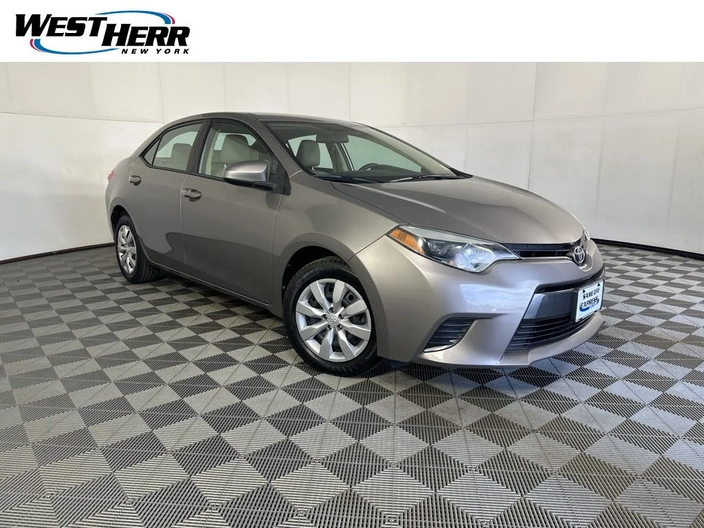 Used 2015 Brown Toyota LE image 1