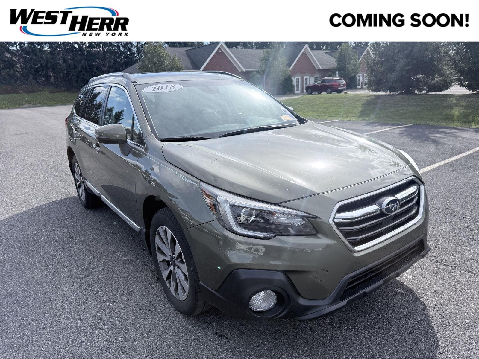 Used 2018 Wilderness Green Metallic Subaru Touring image 1