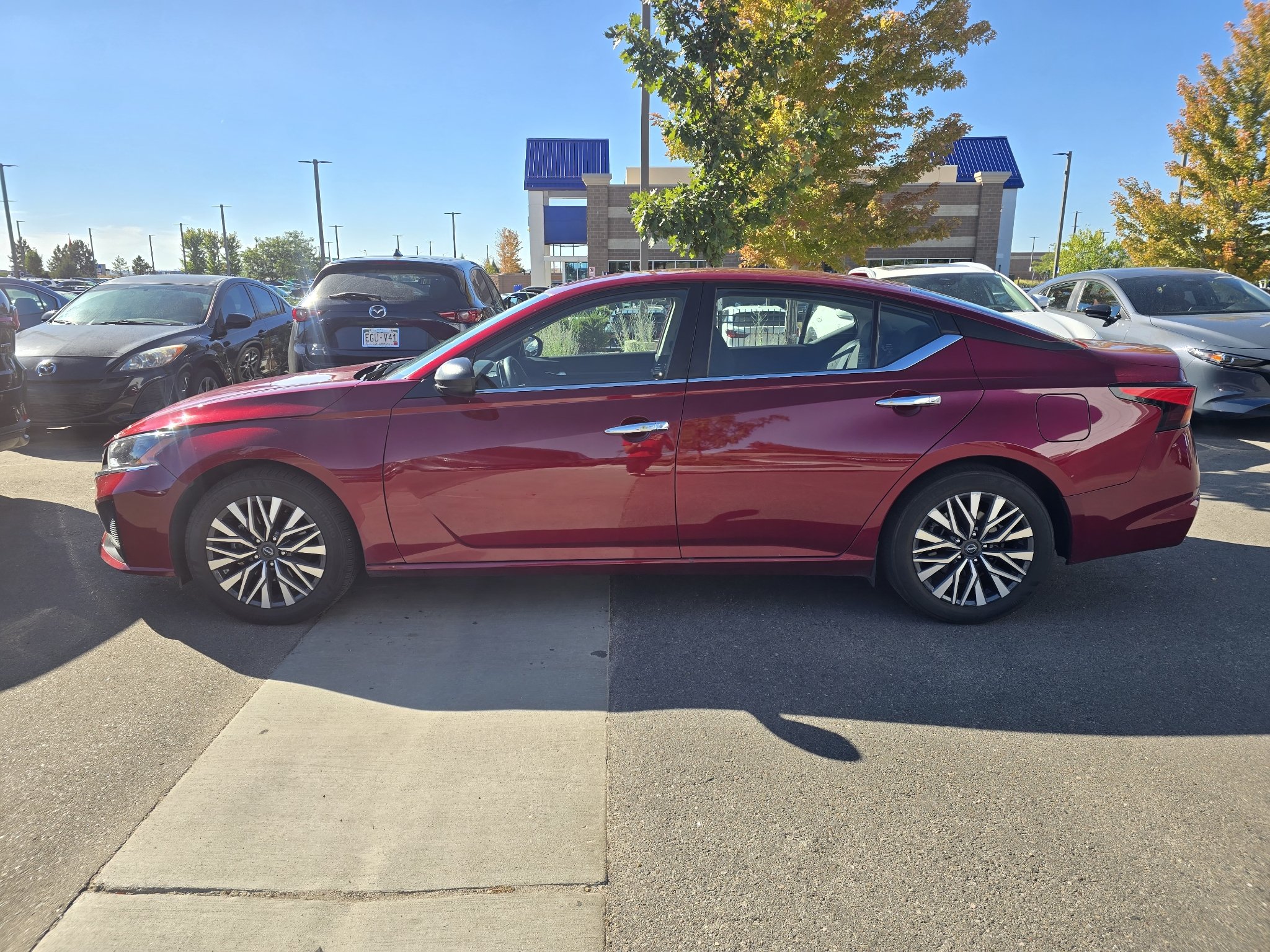 Used 2025 Scarlet Ember Nissan SV image 2