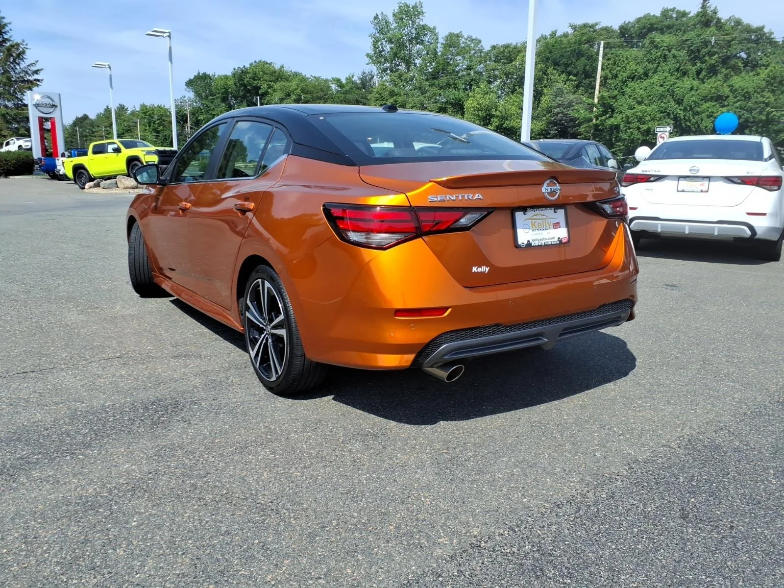 Certified Used 2023 Monarch Orange Metallic/Super Black Nissan SR image 7