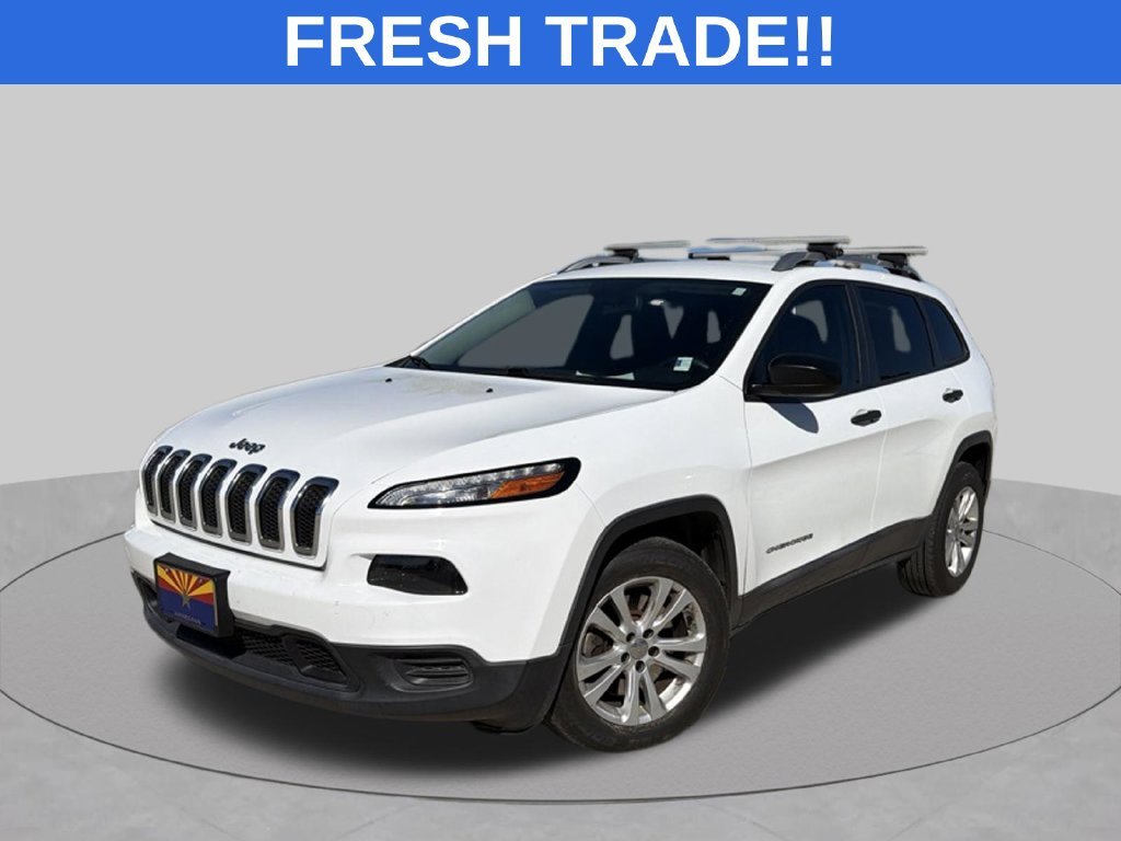 Used 2015 White Jeep Sport image 1