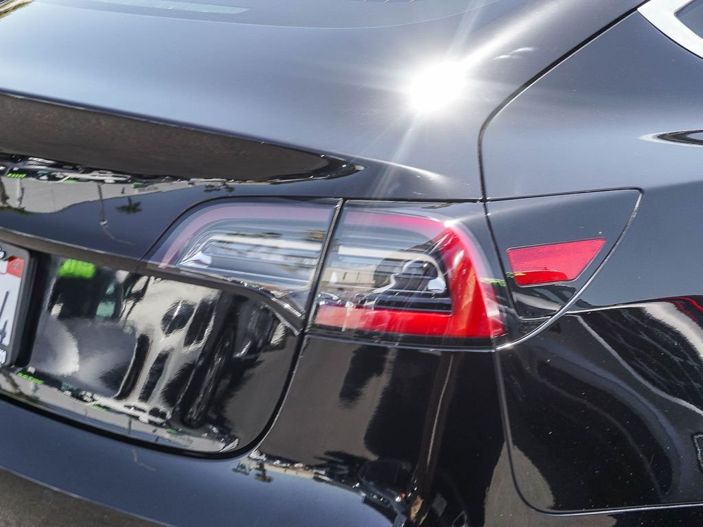 Used 2019 Solid Black Tesla Standard Range Plus image 6