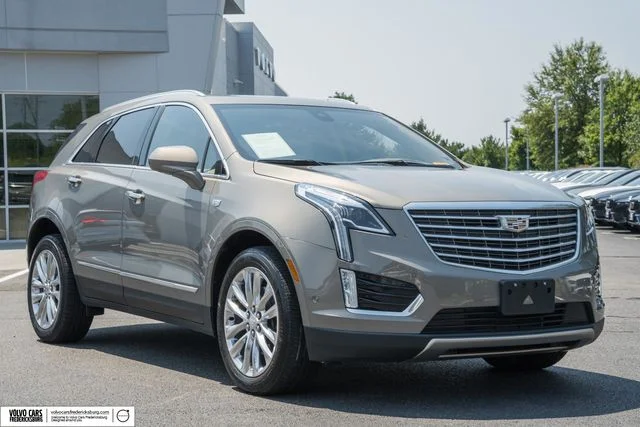 Used 2019 Brown Cadillac Platinum image 1