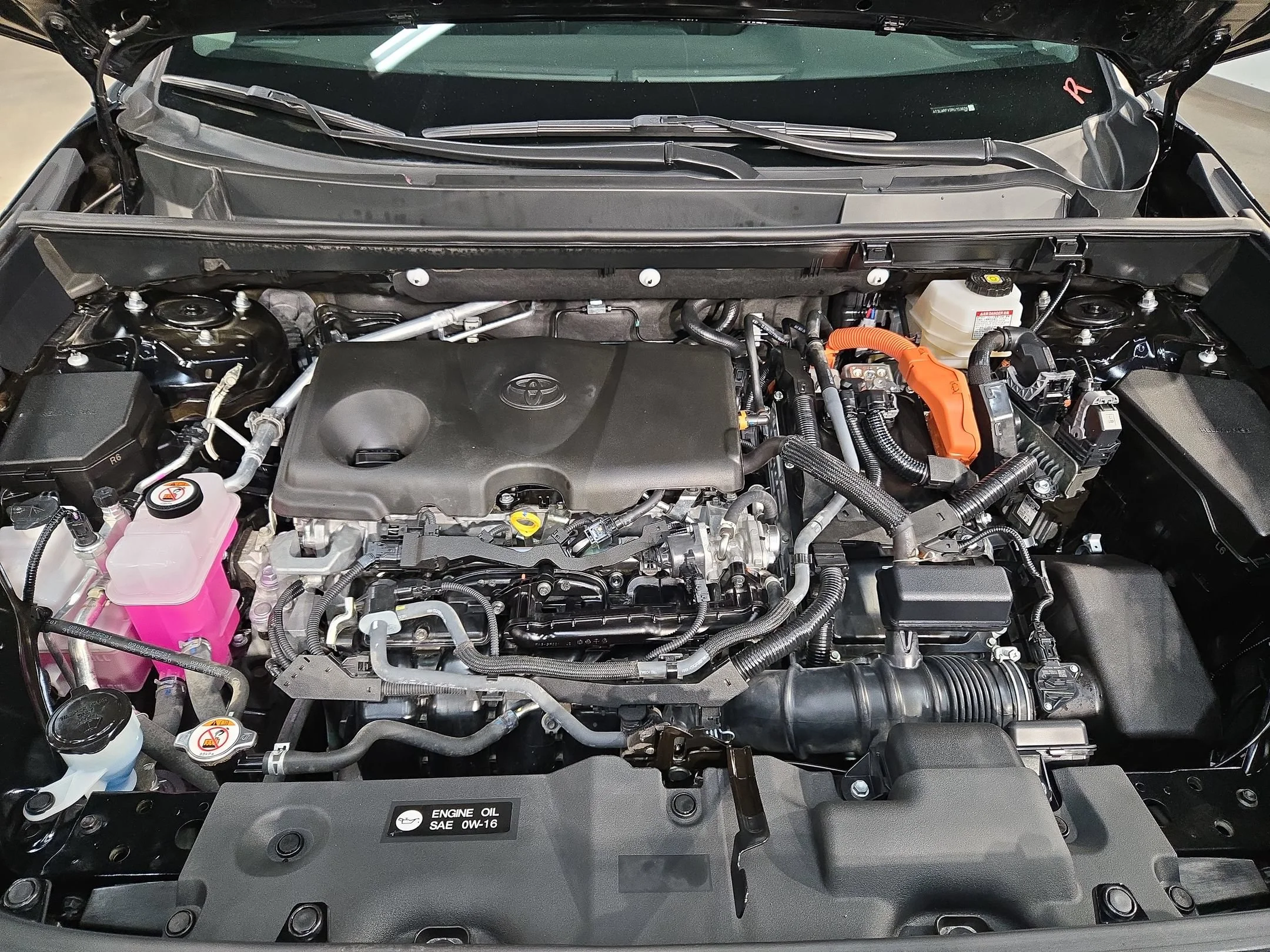 Certified Used 2024 Midnight Black Metallic Toyota Hybrid LE image 19