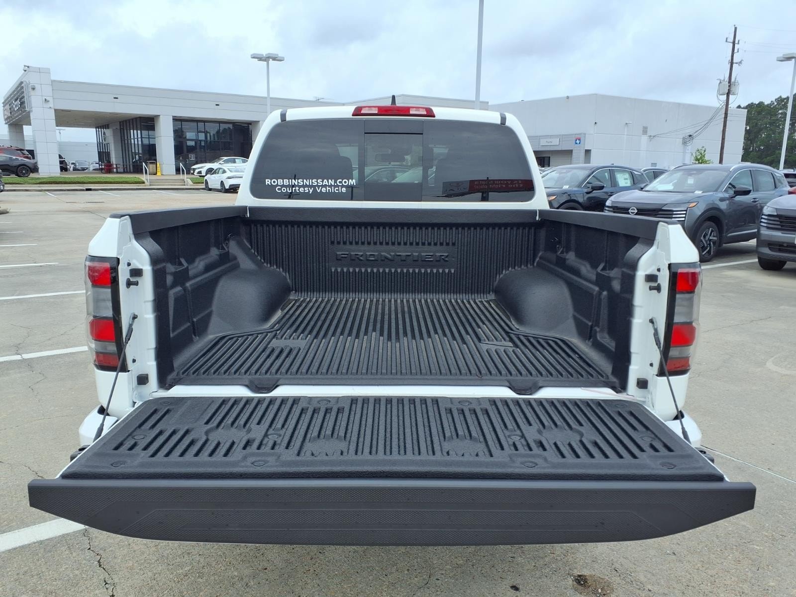 2026 Nissan Frontier SV White at Robbins Nissan