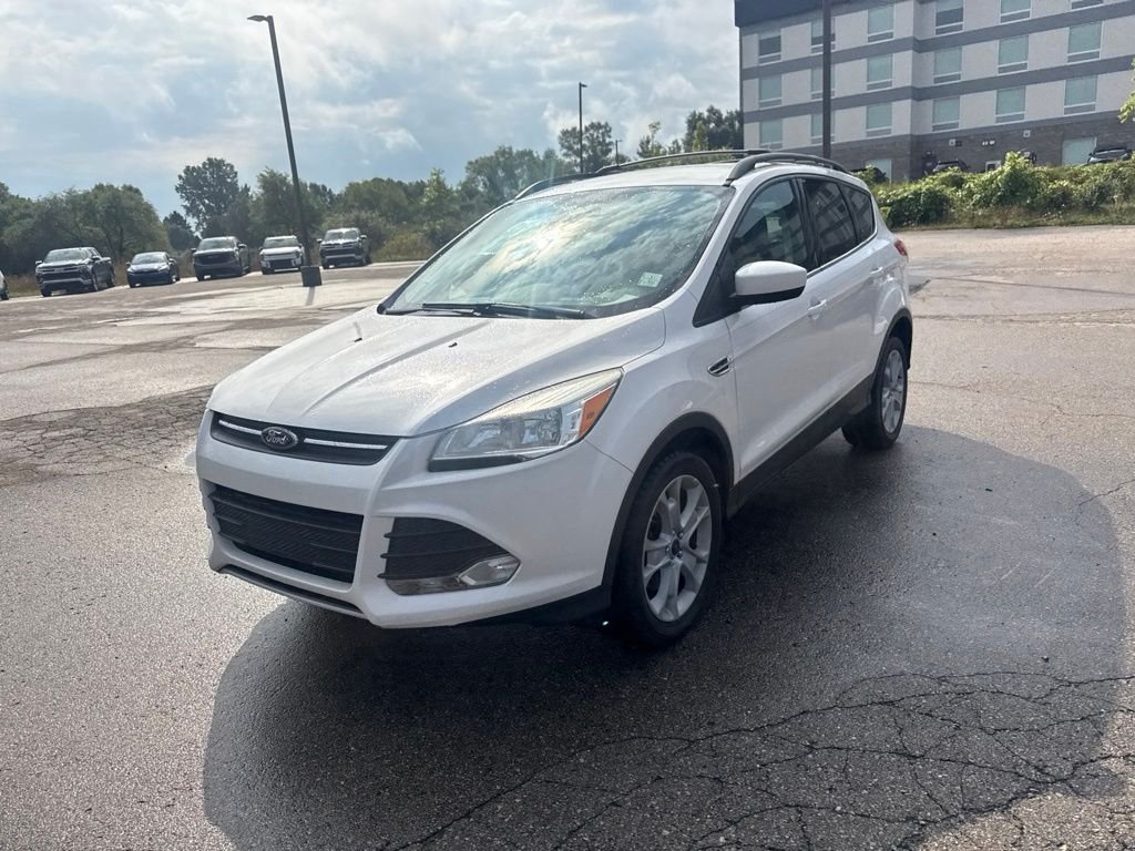 Used 2013 White Platinum Ford SE image 5