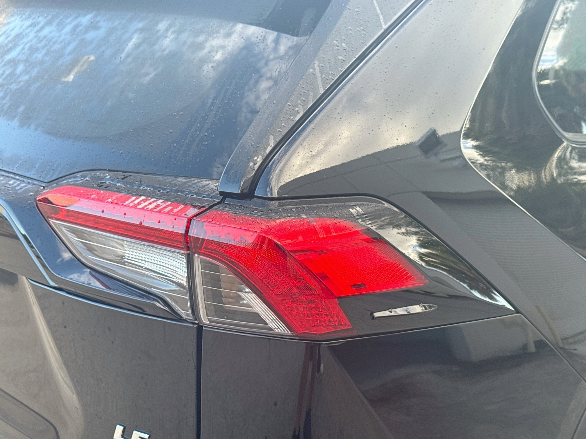 Used 2025 Midnight Black Metallic Toyota Hybrid LE image 26