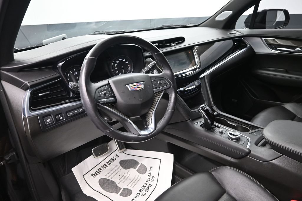 Used 2023 Stellar Black Metallic Cadillac Sport image 13