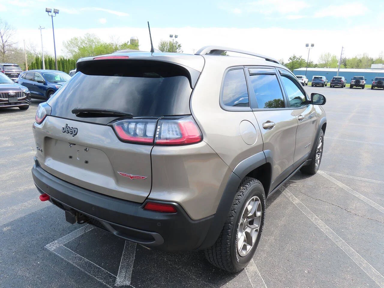 Used 2021 Light Brownstone Pearl Coat Jeep Trailhawk 4x4 4dr SUV image 4