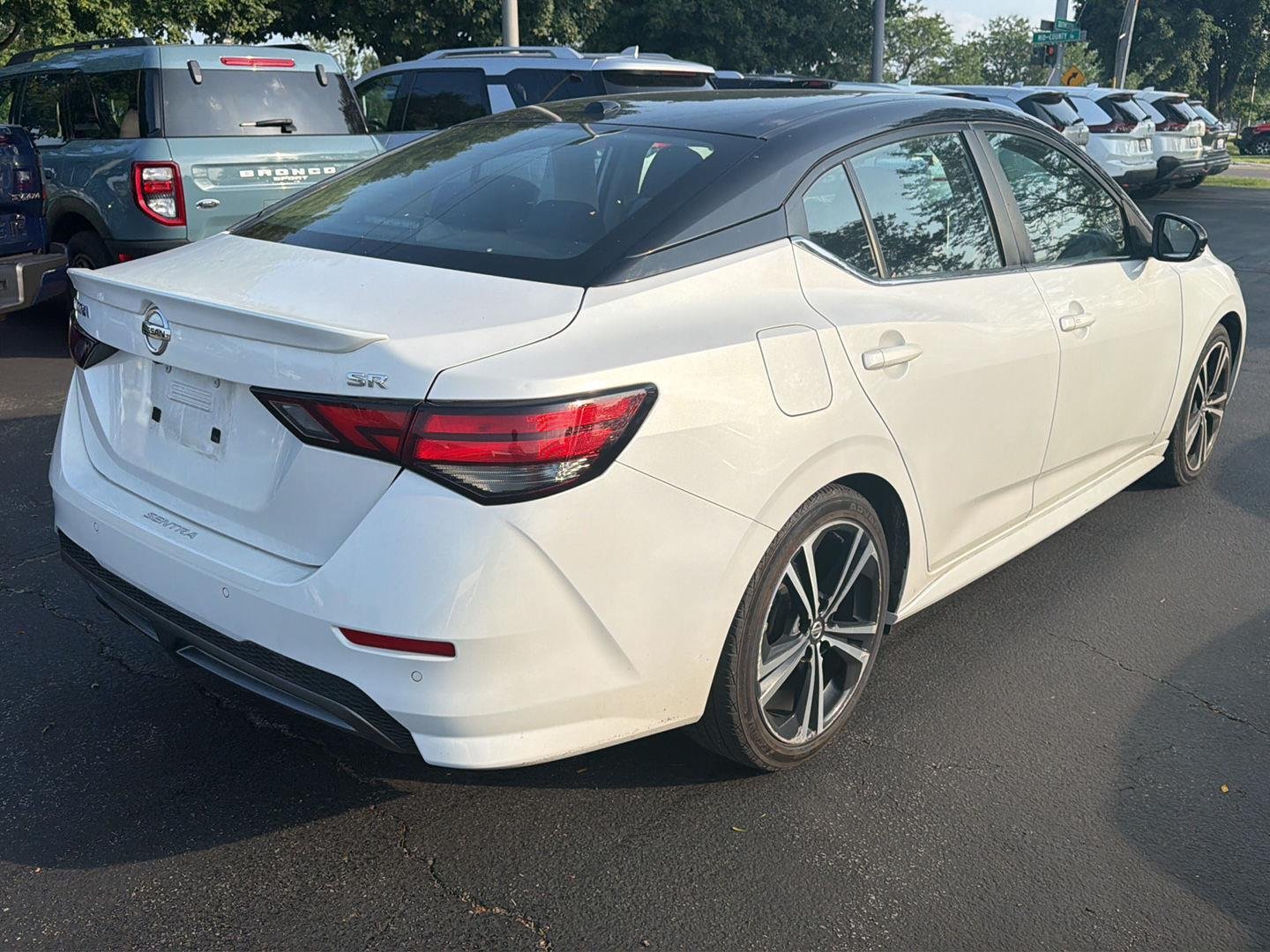 Used 2021 Aspen White/Super Black Nissan SR image 4