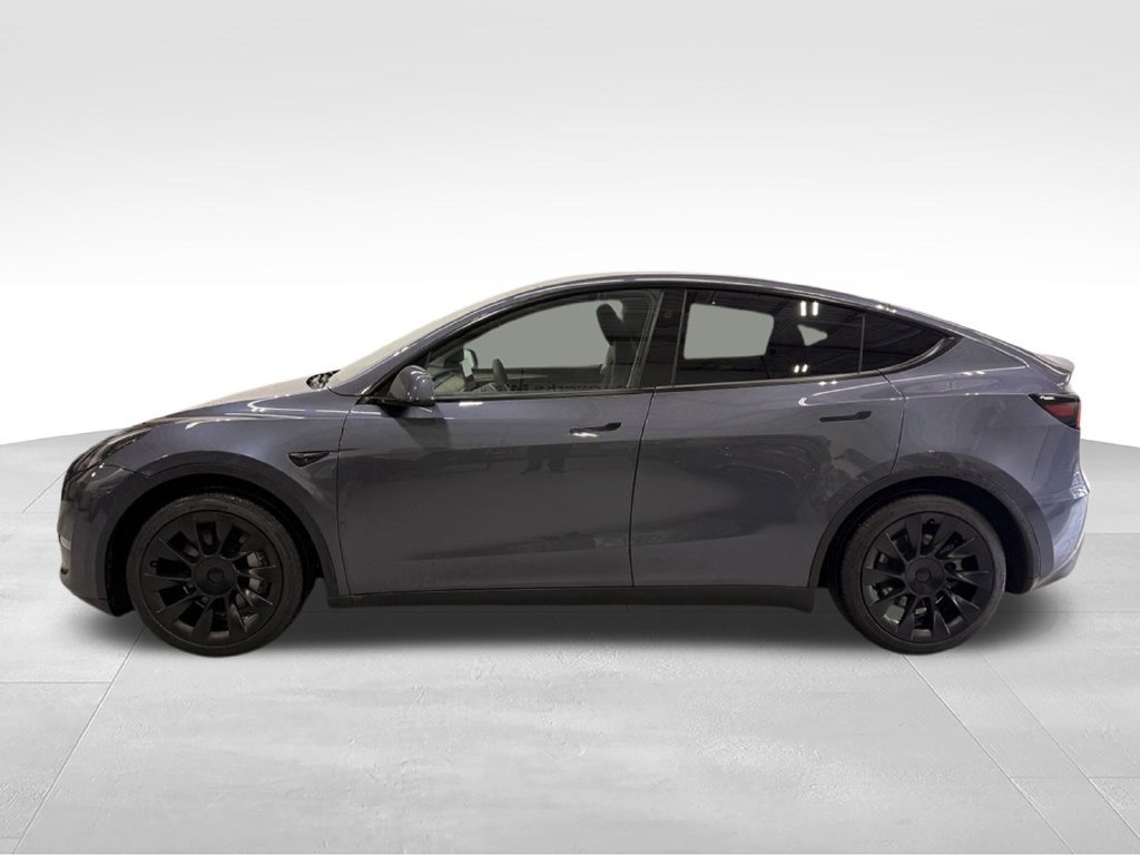 Used 2023 Tesla Model Y Long Range with VIN 7SAYGDEE4PF888728 for sale in Golden Valley, Minnesota
