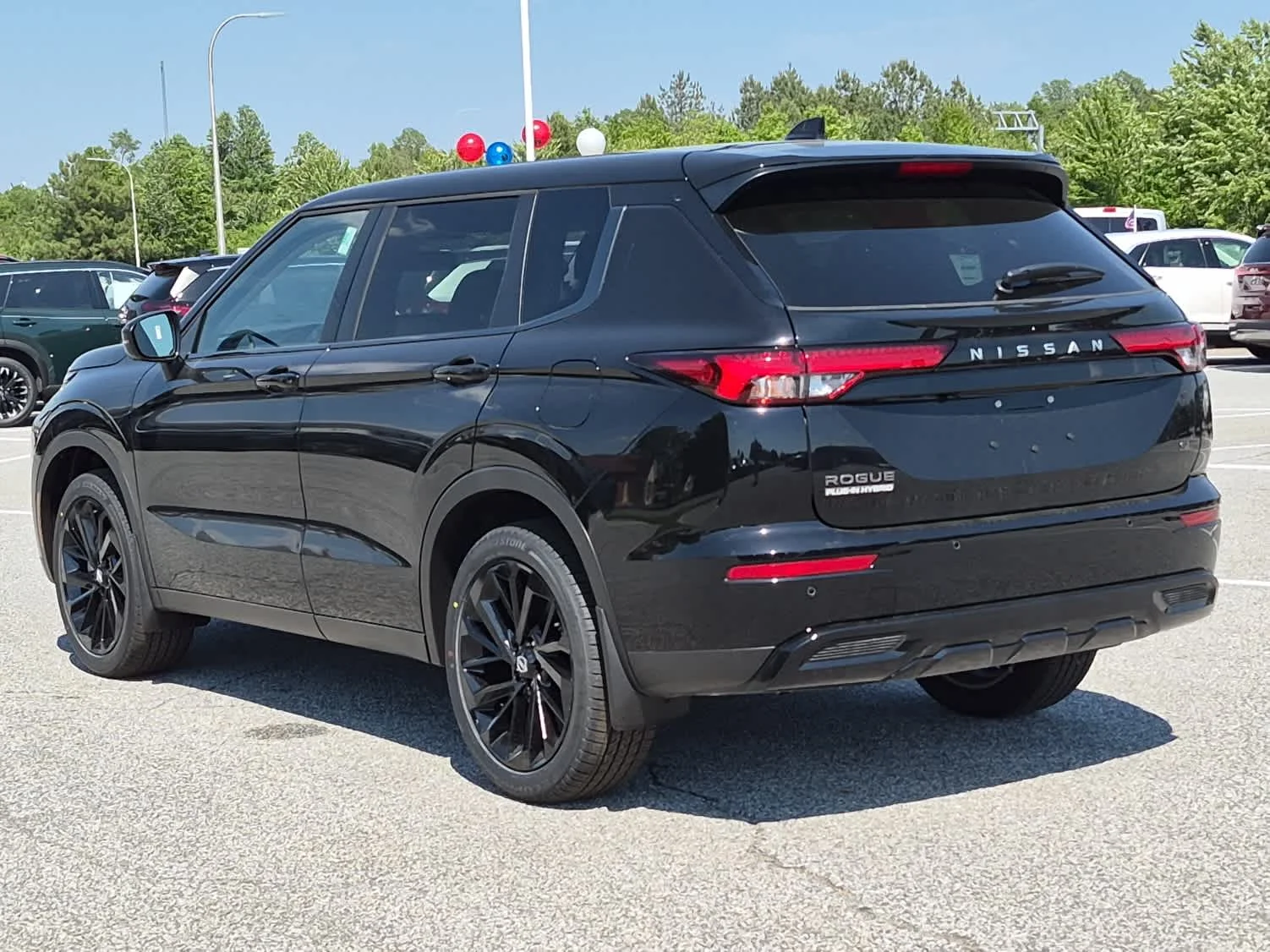 New 2026 Cosmic Black Nissan SL image 4