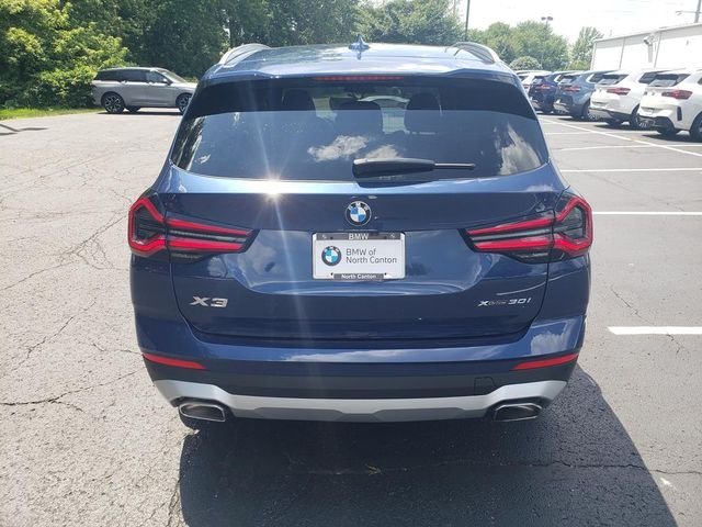 Used 2023 Blue Metallic BMW xDrive30i image 4