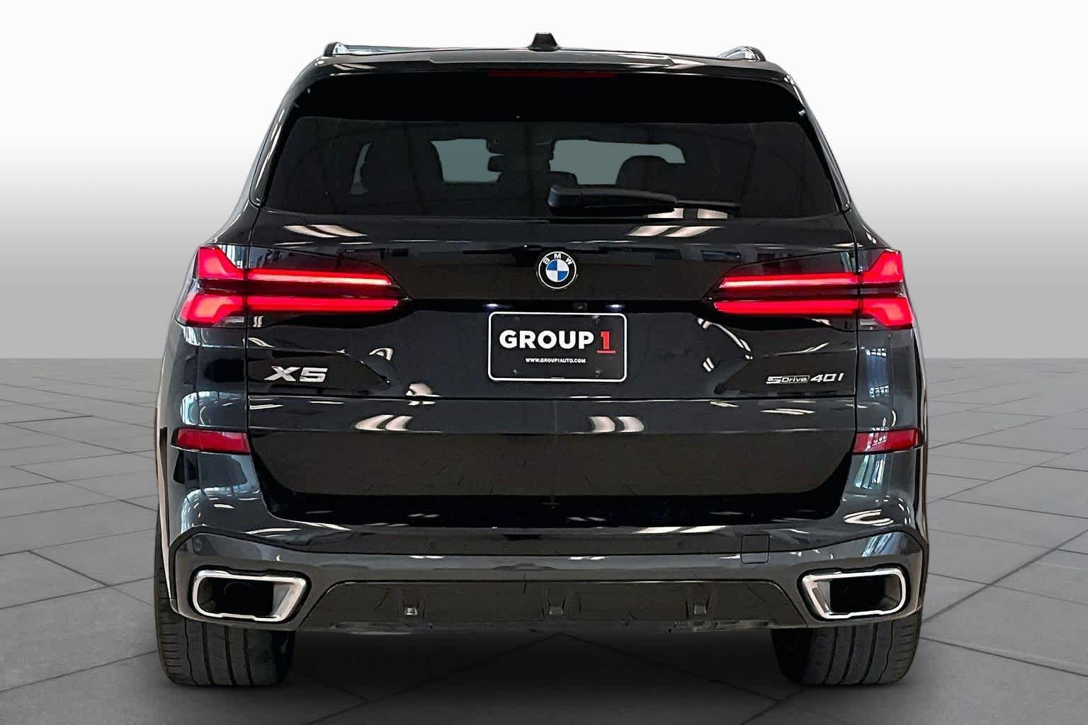 Used 2024 Black Sapphire Metallic BMW sDrive40i image 4