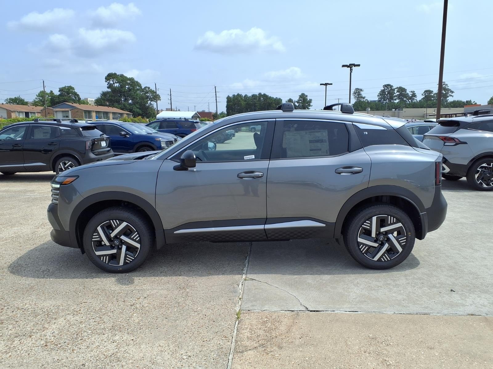 New 2026 Gun Metallic Nissan SV image 8